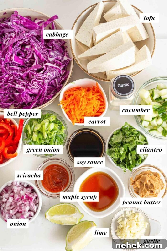 Labelled ingredients for a Thai chopped salad with tofu and rice.