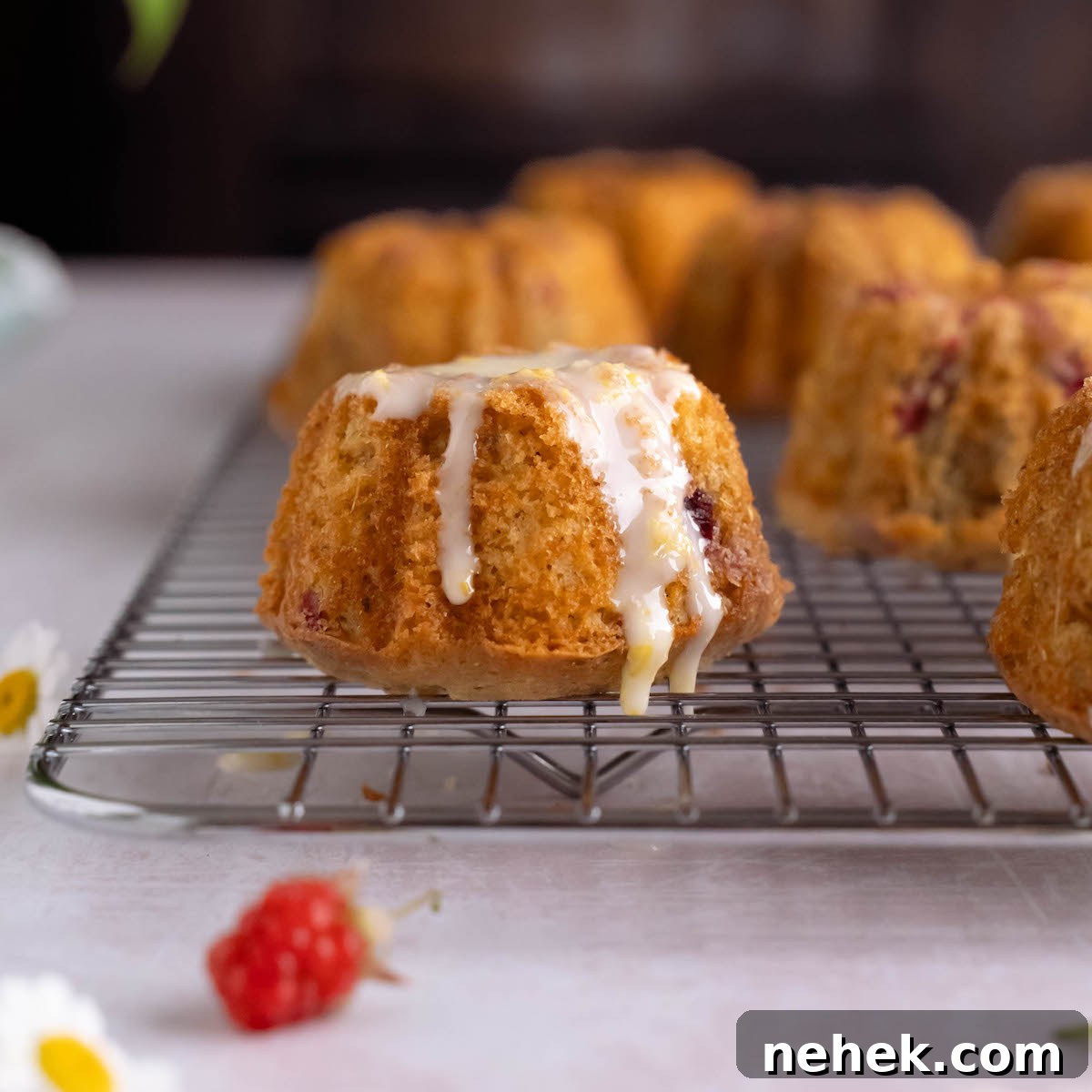 Raspberry and Chamomile Tea Cakes with Lemon Glaze 4 Mini raspberry cake glazed with lemon icing