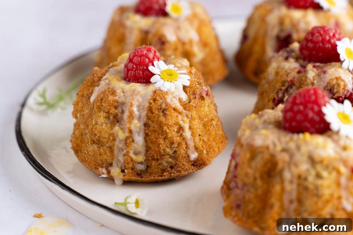 Raspberry and Chamomile Tea Cakes with Lemon Glaze 5 Mini raspberry chamomile cakes