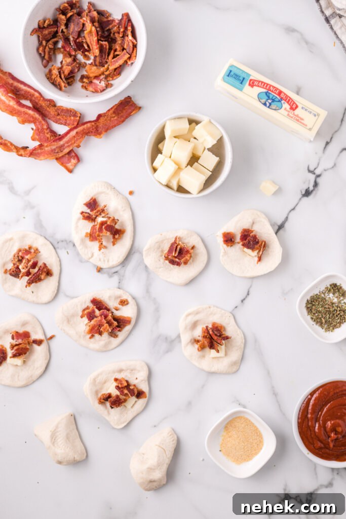 bacon added to the center of each biscuit dough