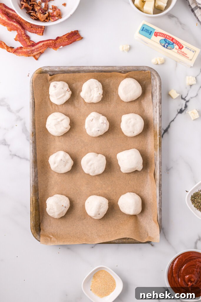 place the biscuit bombs on a baking sheet.