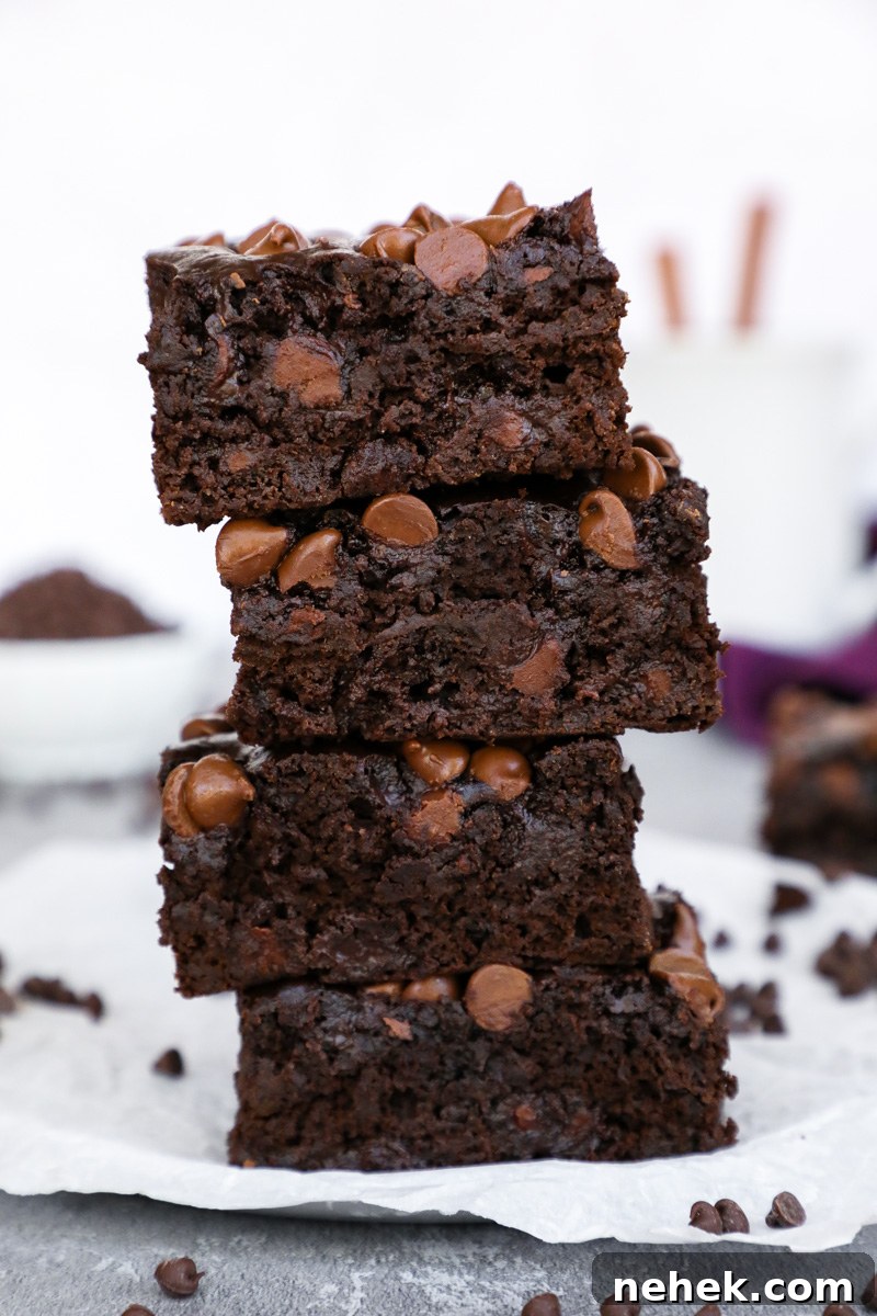 Fudgy Butternut Squash Brownies with Dark Chocolate Swirl 6 4 thick butternut squash brownies stacked on top of each other