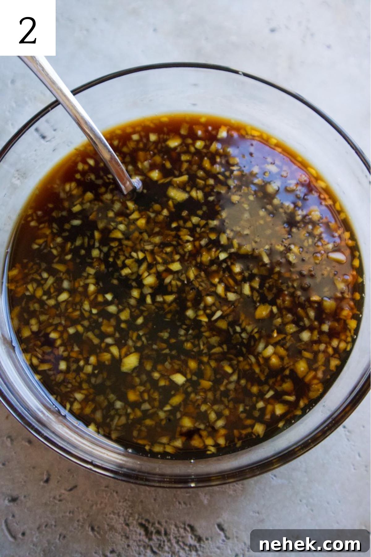 glass bowl with honey ginger sauce.