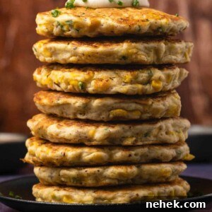 vegan corn fritters stacked on top of each other