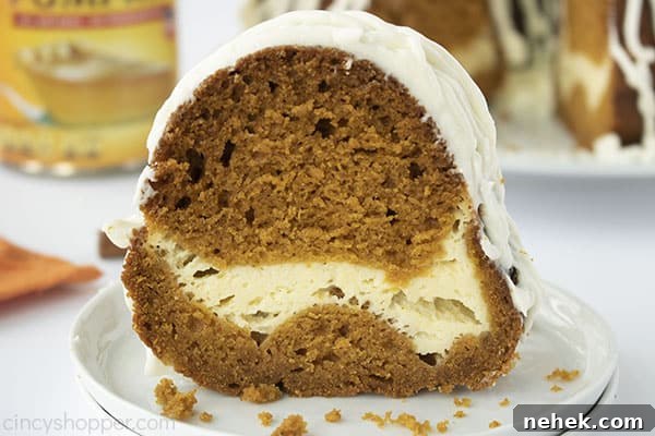 Slice of Pumpkin cake on a white plate.