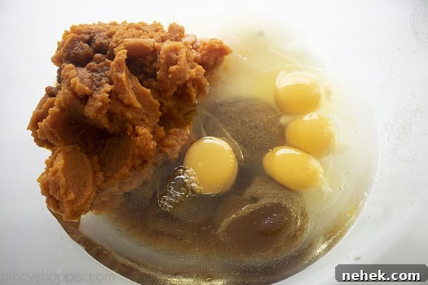 Wet ingredients in a clear bowl,