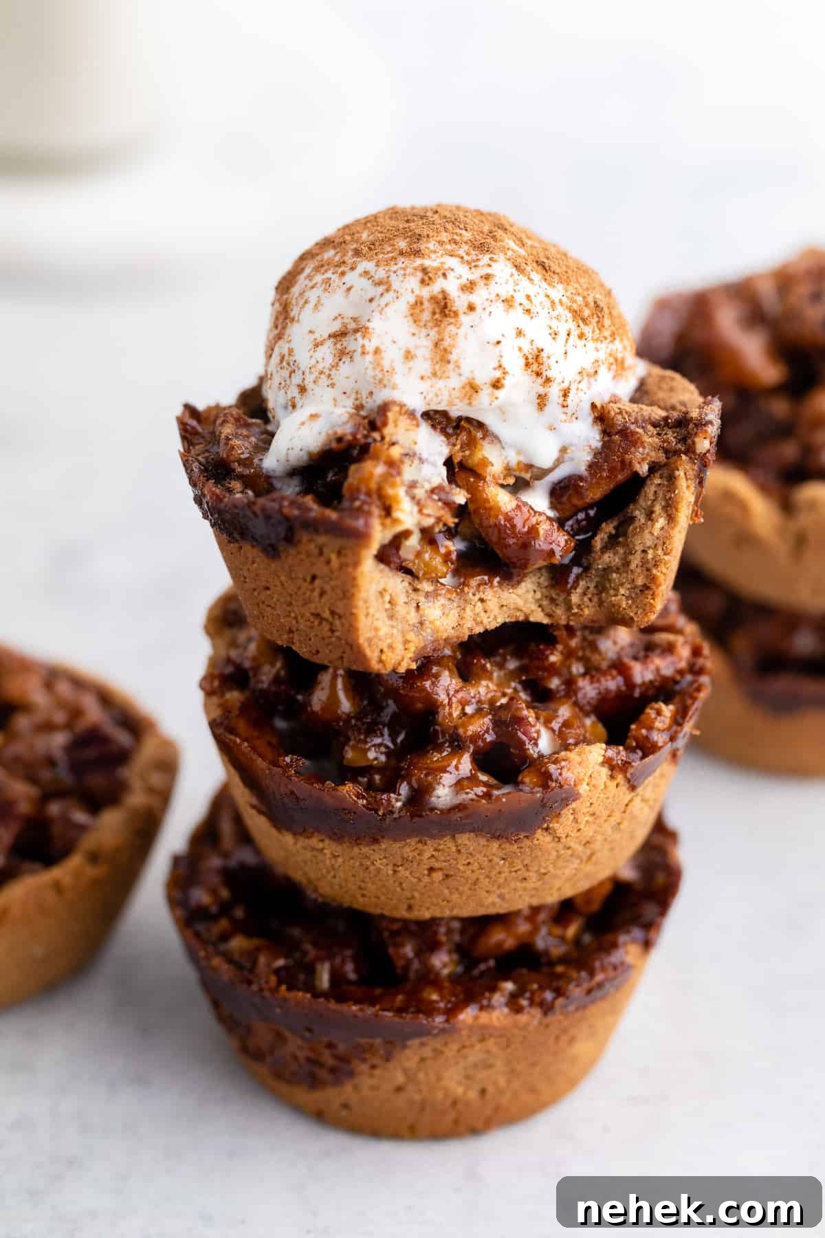 mini pecan pies stacked with ice cream