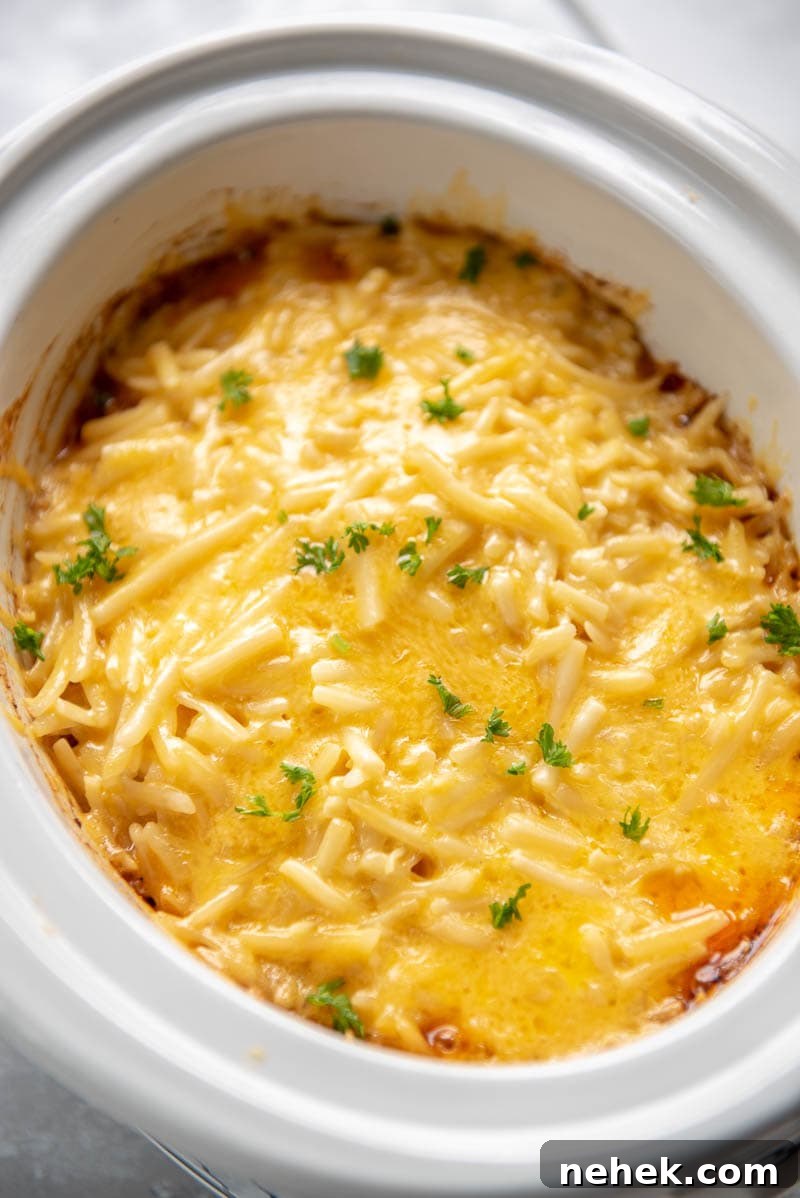 sloppy joe casserole in a white slow cooker