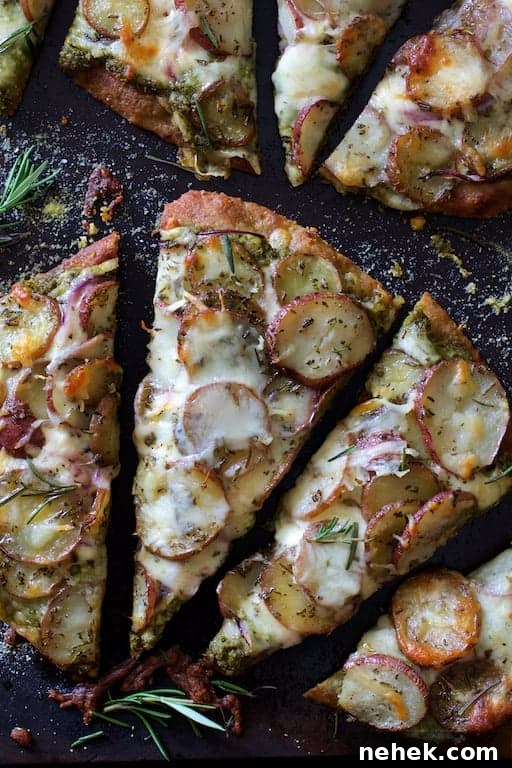 Crispy Potato Flatbread Recipe: Step-by-Step Homemade Guide 8 Close-up of Naan Potato Pizza with Radish Pesto and Smoked Mozzarella cut into slices.