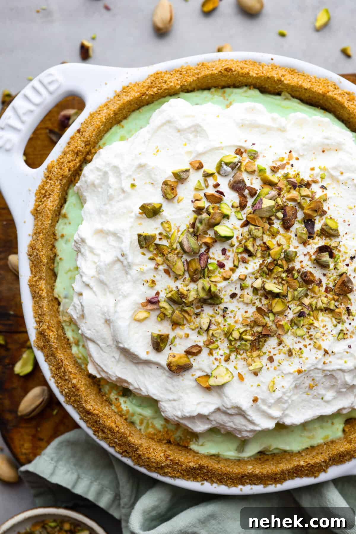 Top view of the no-bake pistachio cream pie garnished with pistachios.