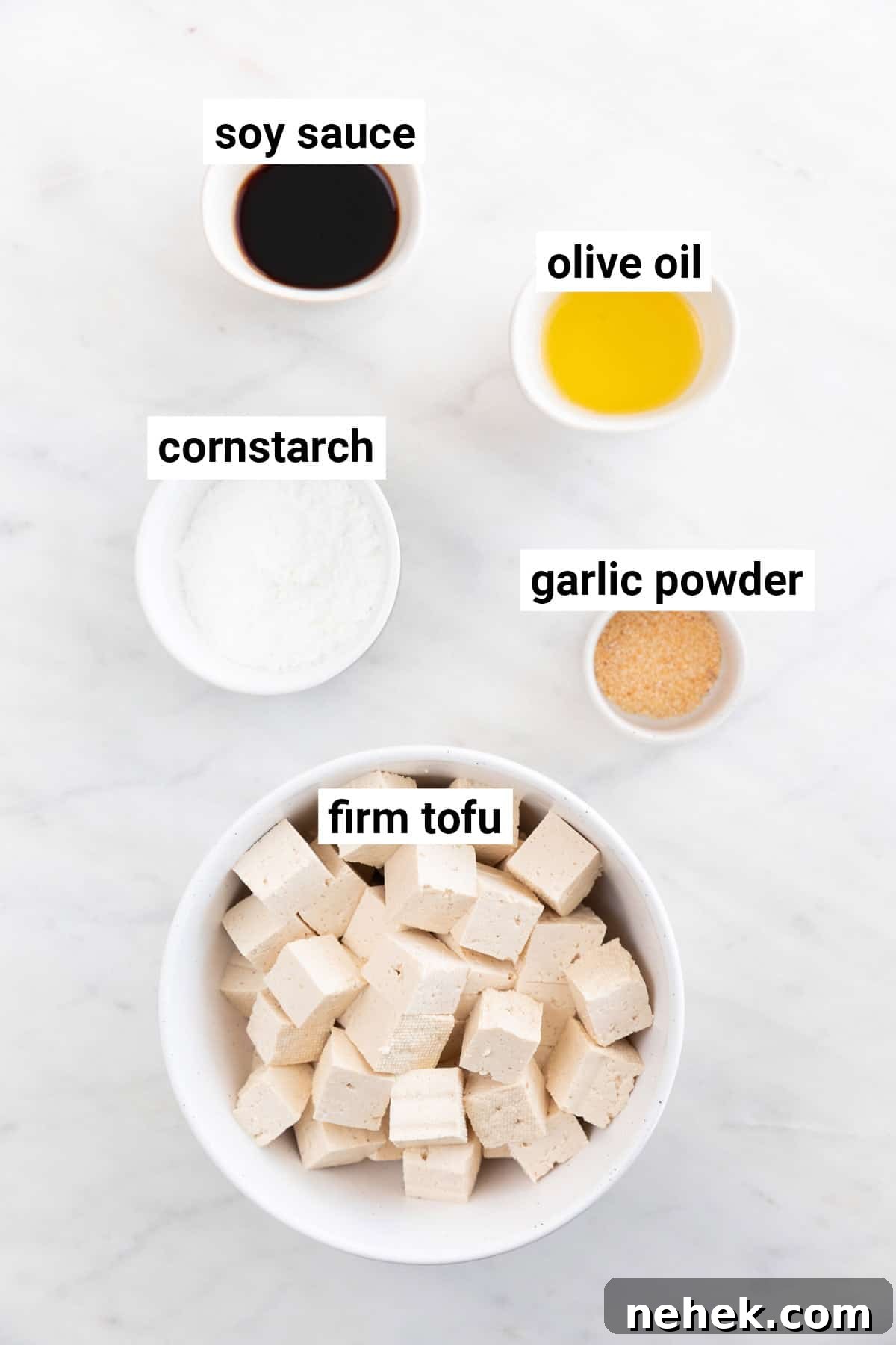 Crispy Oven-Baked Tofu with Golden Crunch 3 Ingredients needed to make crispy baked tofu.