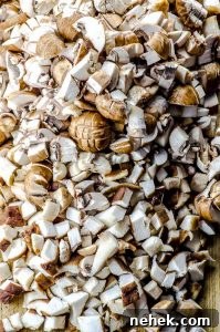 High-Protein Mushroom Pasta Recipe for Muscle & Energy 3 Diced mushrooms for mushroom pasta