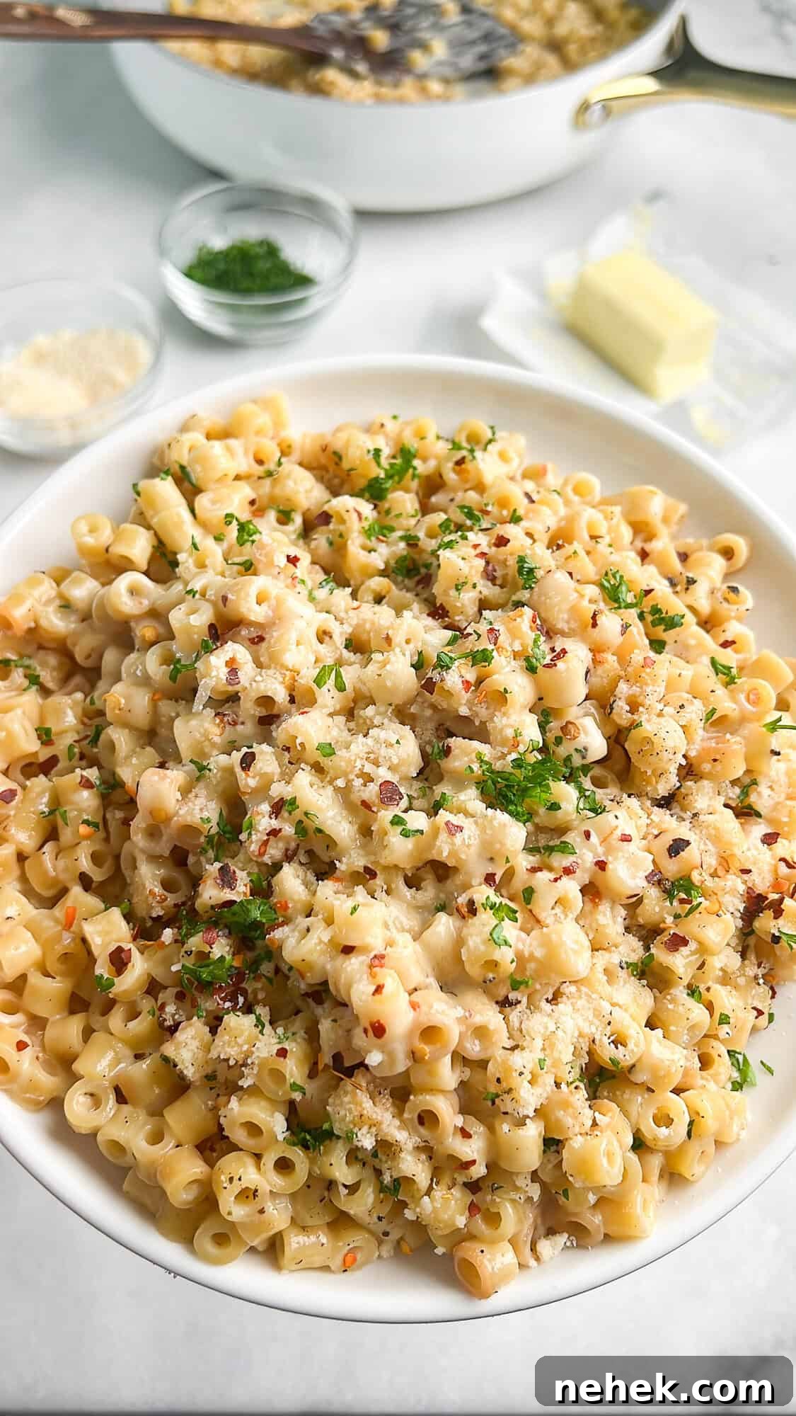 pasta on a plate topped with parsley
