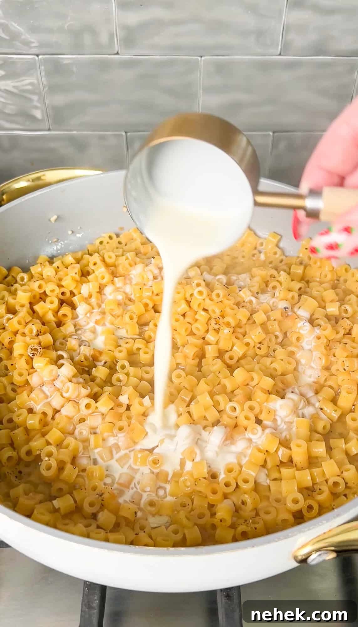 cream pouring into the pan