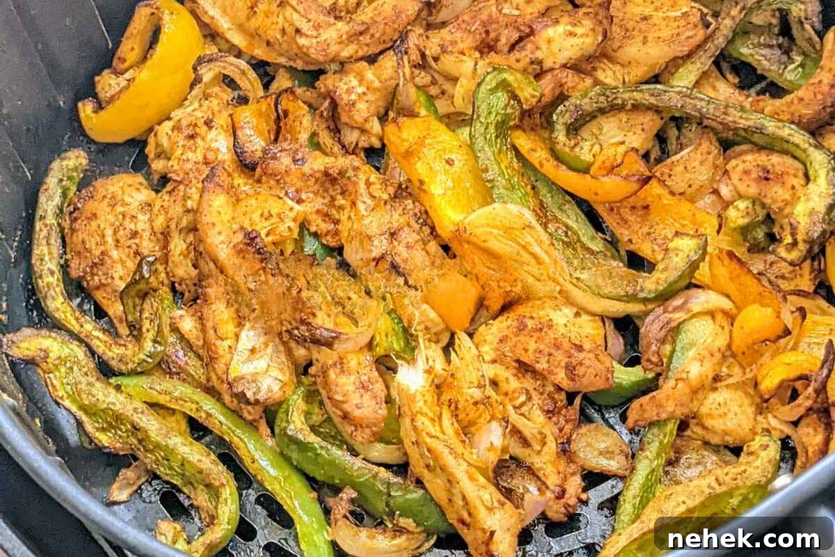 Air Fryer Recipes That’ll Stay on Your Menu Forever 19 Close up of chicken fajitas