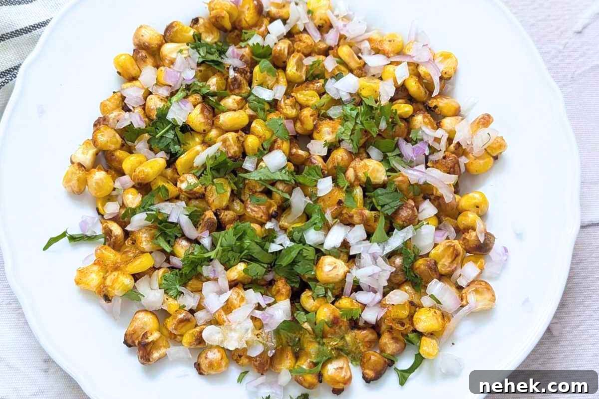 Air Fryer Recipes That’ll Stay on Your Menu Forever 7 Plate of delicious crispy corn