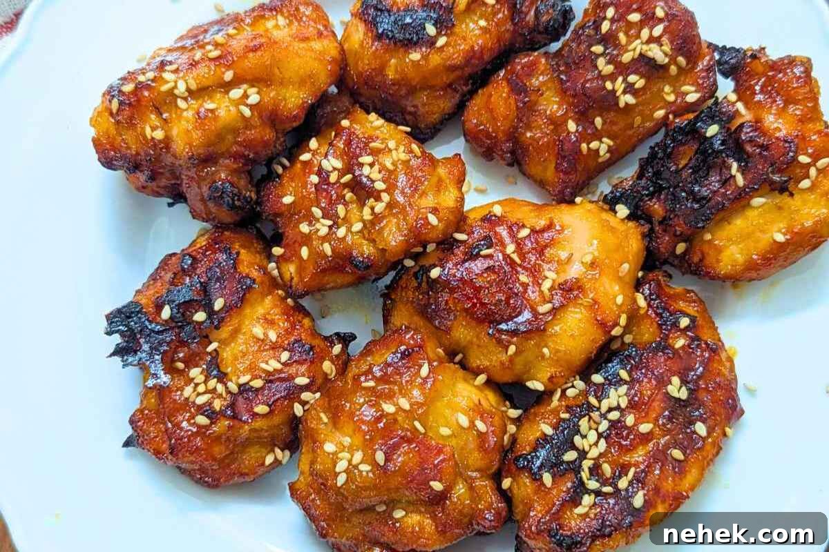 Air Fryer Recipes That’ll Stay on Your Menu Forever 9 Air fryer teriyaki chicken bites on a plate