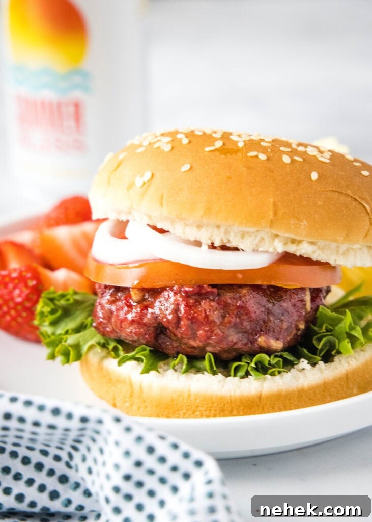 How to Make Smoked Burgers That Stay Juicy and Flavorful 2 smoked hamburger on a plate