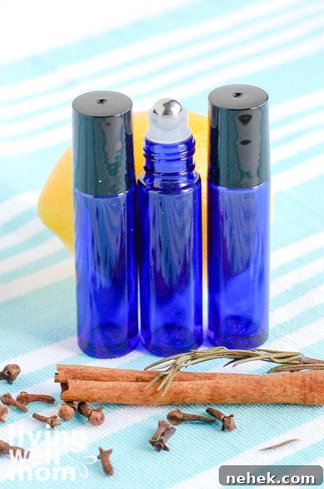 5 Essential Oils to Boost Immunity and How to Use Them 5 roller bottles with DIY oil blend for immunity