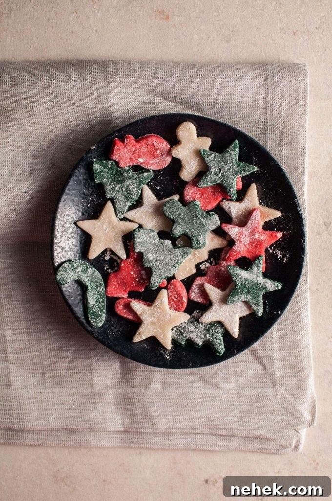 Christmas Marzipan Gifts and Recipes for Festive Treats 3 plate of homemade marzipan holiday treats in different festive shapes like Christmas trees, stars, and candy canes