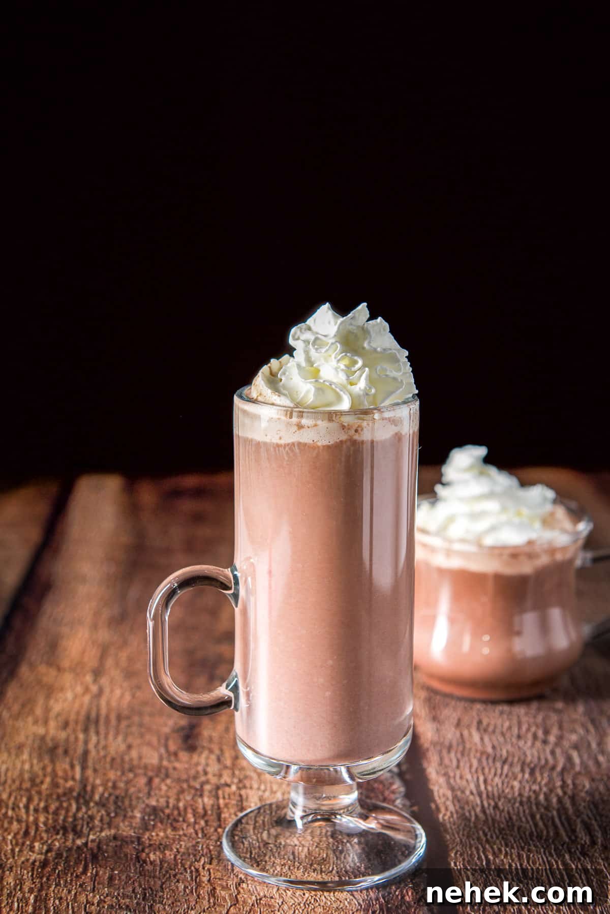 Snow Plow Cocktail Recipe: Creamy Coffee Brunch Cocktail 5 Two glass mugs filled with the chocolate drink with whipped cream on top