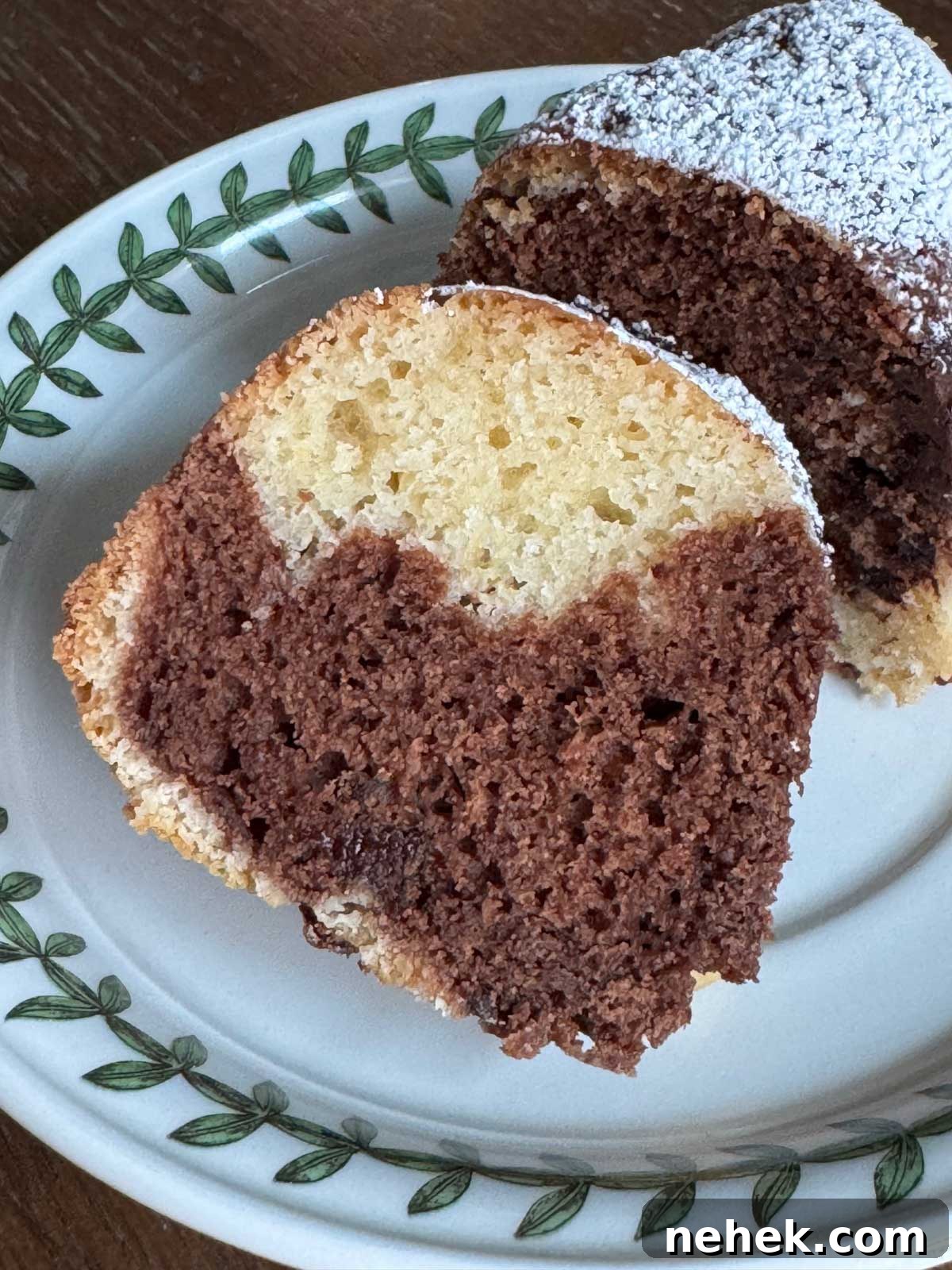 Moist Sour Cream Marble Bundt Cake with Chocolate-Vanilla Swirl 2 Slice of Moist Sour Cream Marble Cake inspired by a recipe in The Settlement Cookbook.