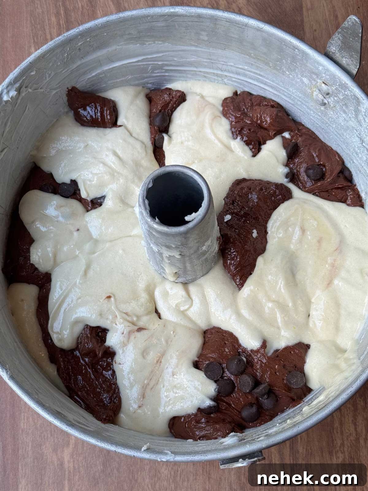 Moist Sour Cream Marble Bundt Cake with Chocolate-Vanilla Swirl 4 Batter for The Settlement Cookbook Marble Cake in a tube pan.