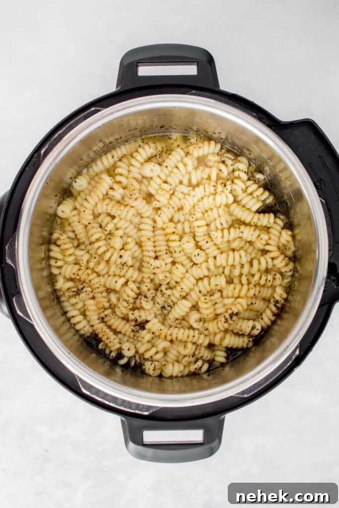 Creamy Instant Pot Chicken Pesto Pasta 9 Cooked pasta in the Instant Pot.
