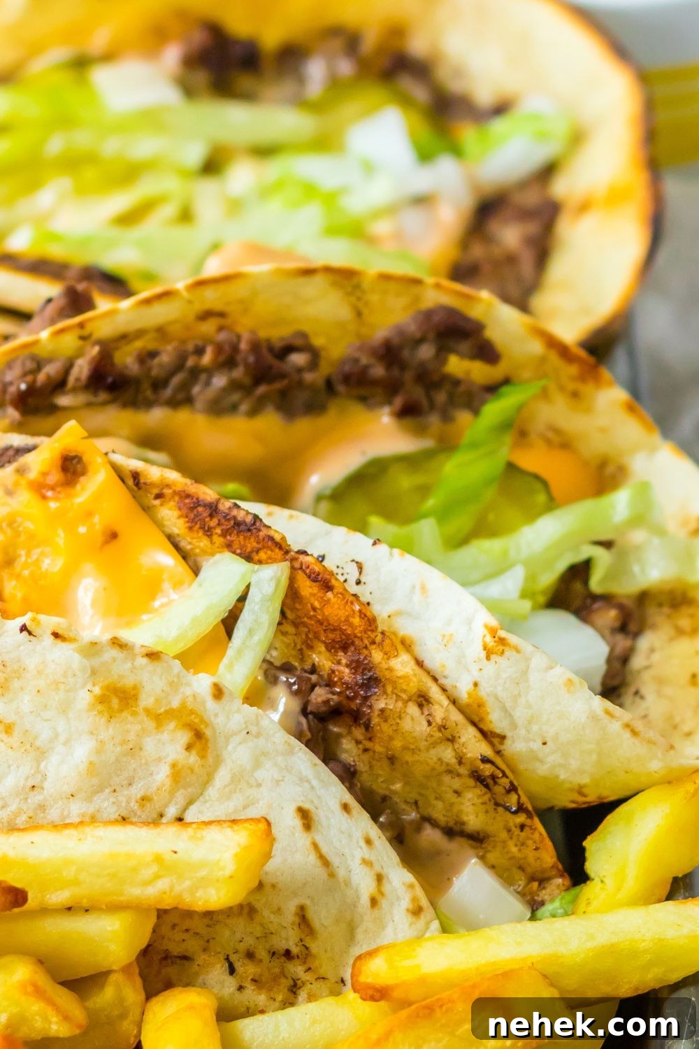 Big Mac Smash Tacos Recipe: Crispy Beef Tacos with Special Sauce 13 platter with Big Mac tacos and french fries on a metal tray