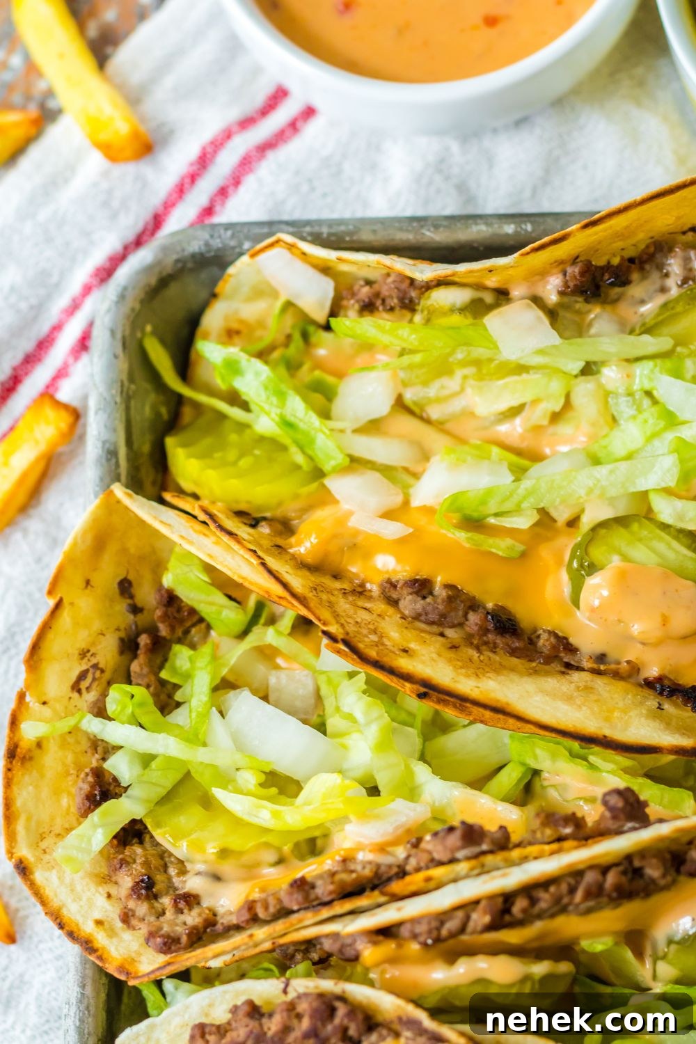 Big Mac Smash Tacos Recipe: Crispy Beef Tacos with Special Sauce 4 overhead shot of Big Mac Smash Tacos on tray