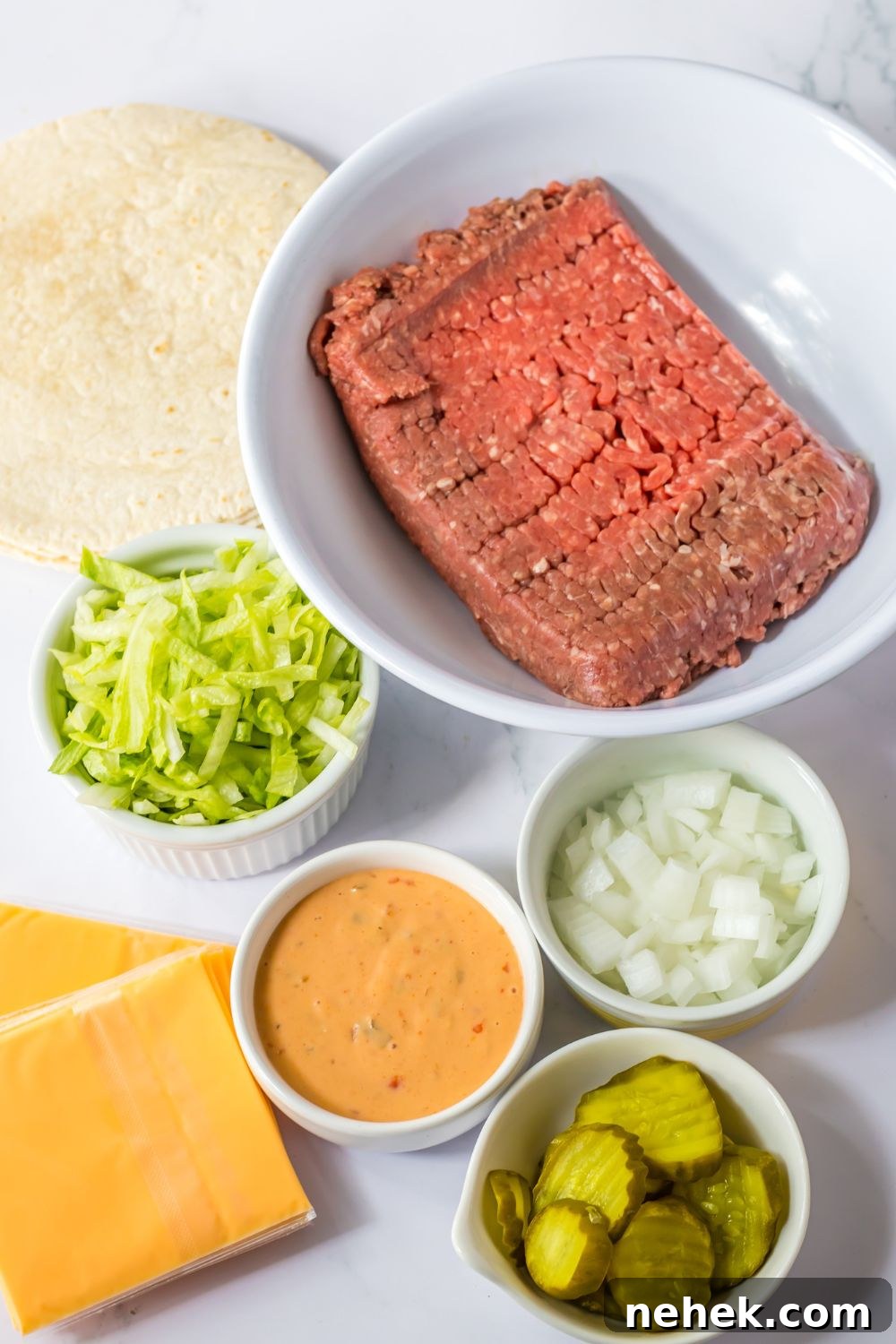 Big Mac Smash Tacos Recipe: Crispy Beef Tacos with Special Sauce 5 ingredients for big mac tacos on table