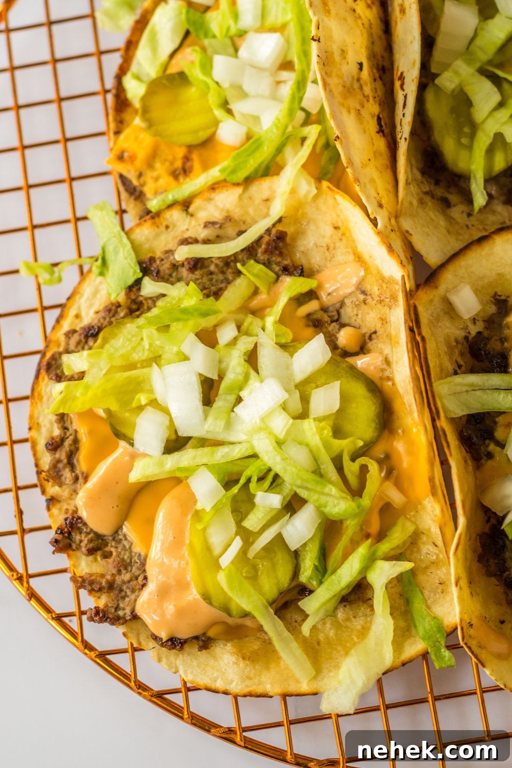 Big Mac Smash Tacos Recipe: Crispy Beef Tacos with Special Sauce 10 overhead shot of big mac style tacos