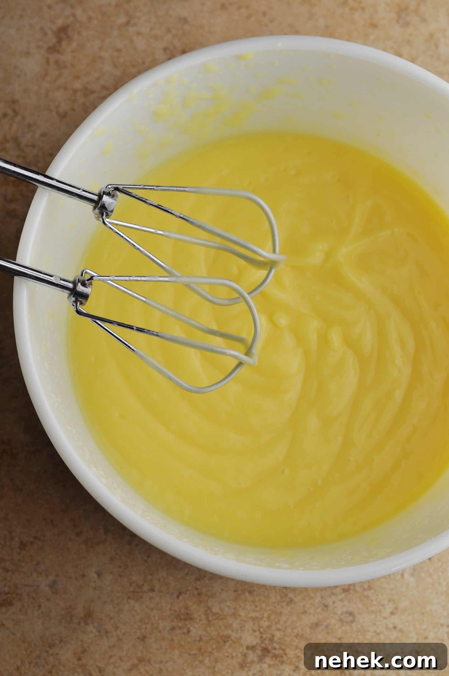 Classic Southern Banana Pudding Recipe 5 Mixing pudding